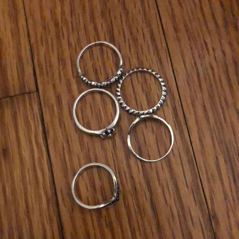 5 silver minimalist rings.